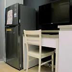 Modern And Full Parquette Studio Springlake Summarecon Bekasi Apartment By Travelio