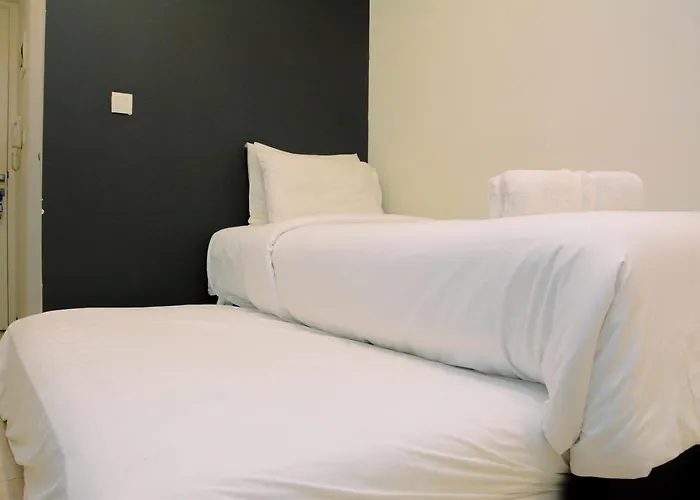 Modern And Full Parquette Studio Springlake Summarecon Bekasi Apartment By Travelio